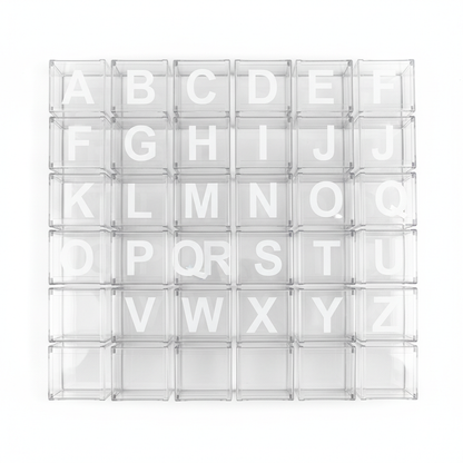 Flat lay of full A to Z transparent letter box collection on white background